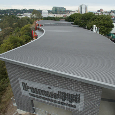 A building with a striking LYSAGHT steel roof
